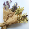 collection of four bunches of dried flowers
