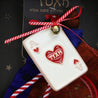 detail of a christmas ornament for luck _an ace of hearts