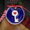 christmas ornament with key and a red heart