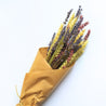 bunch of wheat and lavenders flowers in craft paper