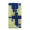 wax chocolate bar with white and blue pieces and sparkles on a white background