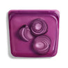 transparent purple silicone bag with cut red onions inside