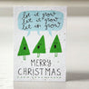 christmas greeting card -three christmas trees "singing" "let it grow" and merry christmas  