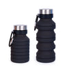 side by side two black collapsible water bottles from silicone with the one fully open 