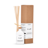 white-opaque-bottle-of-reed-diffuser-with-wooden-sticks-beside-the-paper-craft-box-with-sticker-'lusensa-love-spell'